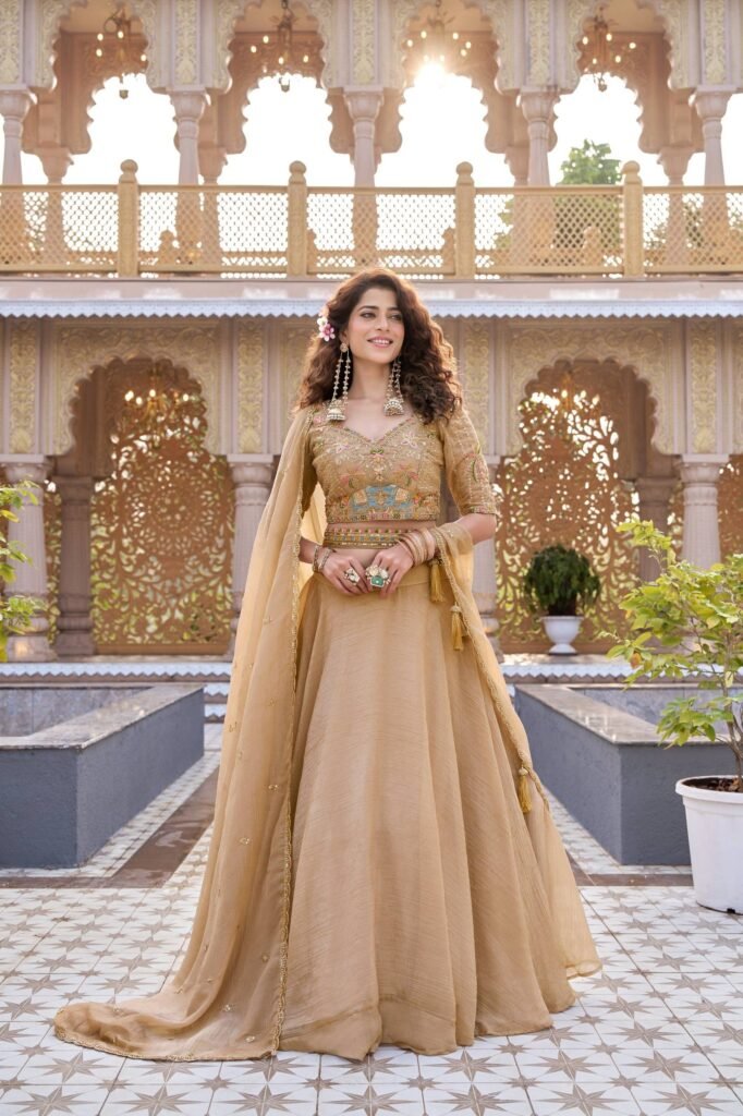 Beige Crunchy Silk Heavily Embroidered Lehenga Choli - Photo 1