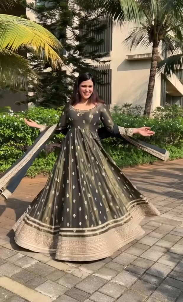 Elegant Olive Green Anarkali Gown with Zari Border - Photo 1