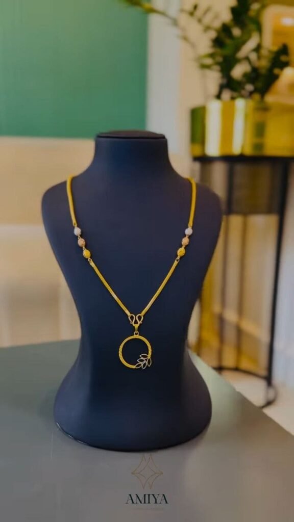 Minimal Gold-Tone Circular Pendant Necklace with Beaded Accents - Photo 1