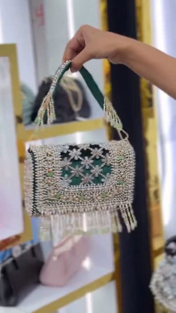 Pearl-Embellished Potli Handbag with Tassel Handle - Photo 2