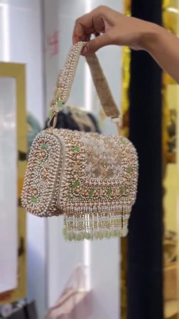 Pearl-Embellished Potli Handbag with Tassel Handle - Photo 3