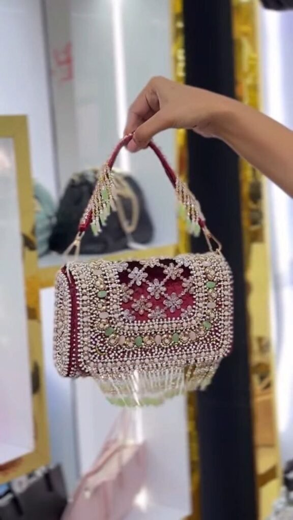 Pearl-Embellished Potli Handbag with Tassel Handle - Photo 4