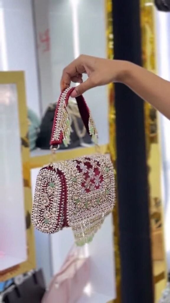 Pearl-Embellished Potli Handbag with Tassel Handle - Photo 5